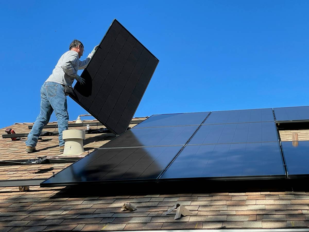 Close-up of weatherproof MC4 solar connectors demonstrating solar power panel installation benefits