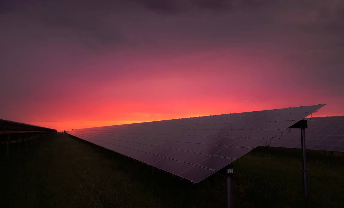 Technician inspecting solar panel connectors during residential installation – putting in solar panels benefits